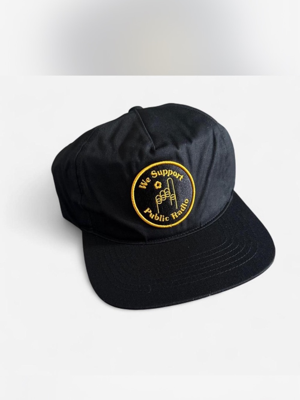 Black 'We Support Public Radio' Embroidered Baseball Cap